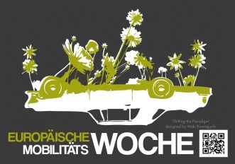 Motiv Woche der Mobilität in Erfurt, Das Motiv zeigt ein umgedrehtes Auto auf dem Pflanzen wachsen