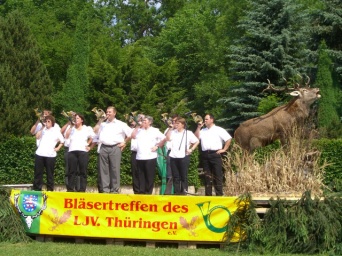 Jagdhornbläser im Wald