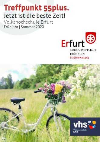 Das Titelbild zeigt ein weißes Fahrrad auf Blumenwiese.