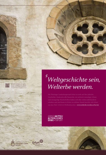 Plakatmotiv "Weltgeschichte sein, Welterbe werden" mit einem Ausschnitt der Fassade der alten Synagoge.