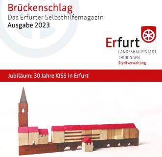 Titelseite von Brückenschlag – Das Erfurter Selbsthilfemagazin – Ausgabe 2023 Titel und Bild von einem Modell der Krämerbrücke in Erfurt.