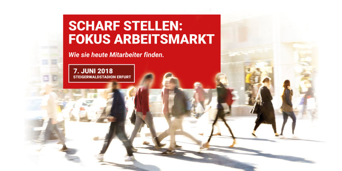 Menschen unscharf in Bewegung. Text: "Scharf stellen: Fokus Arbeitsmarkt"