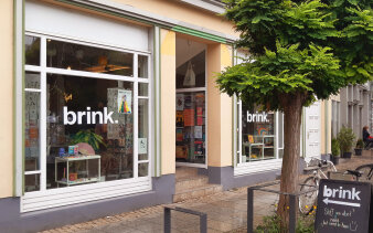 Bild einer Häuserfassade/Ladengeschäft
