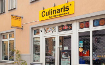Bild einer Häuserfassade/Ladengeschäft