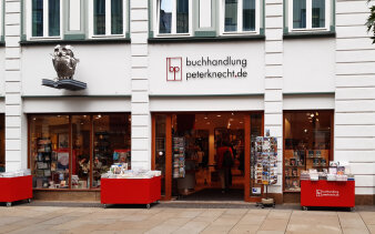 Bild einer Häuserfassade/Ladengeschäft