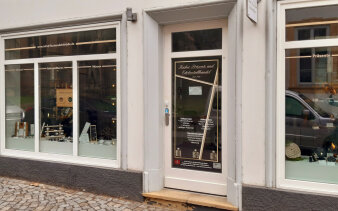 Bild einer Häuserfassade/Ladengeschäft