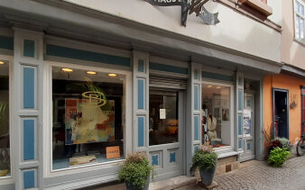 Bild einer Häuserfassade/Ladengeschäft