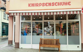 Bild einer Häuserfassade/Ladengeschäft