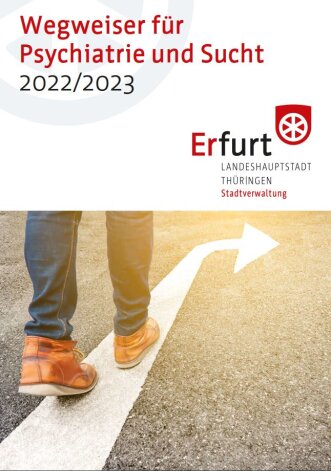 Titelseite des Wegweisers 2022/23 für Psychiatrie und Sucht. Die Titelseite zeigt ein paar Beine, die auf einem nach rechts abbiegenden Pfeil auf der Straße laufen.