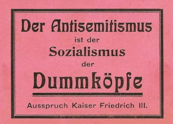 Ein roter Aufkleber auf dem steht: Der Antisemitismus ist der Sozialismus der Dummköpfe.